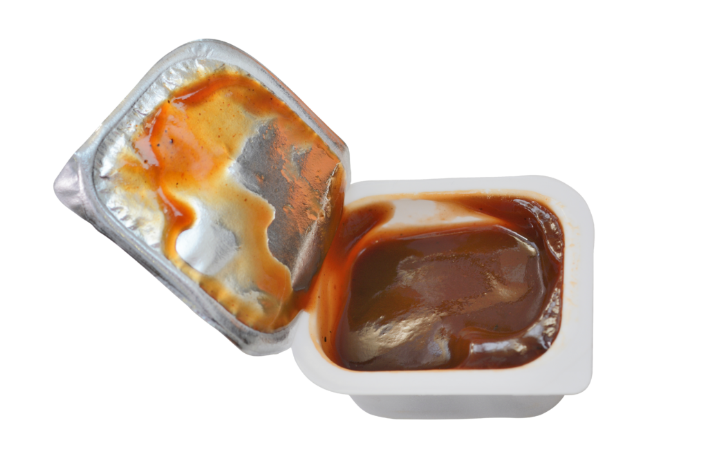 Condiments and Sauce Packets in Boxes